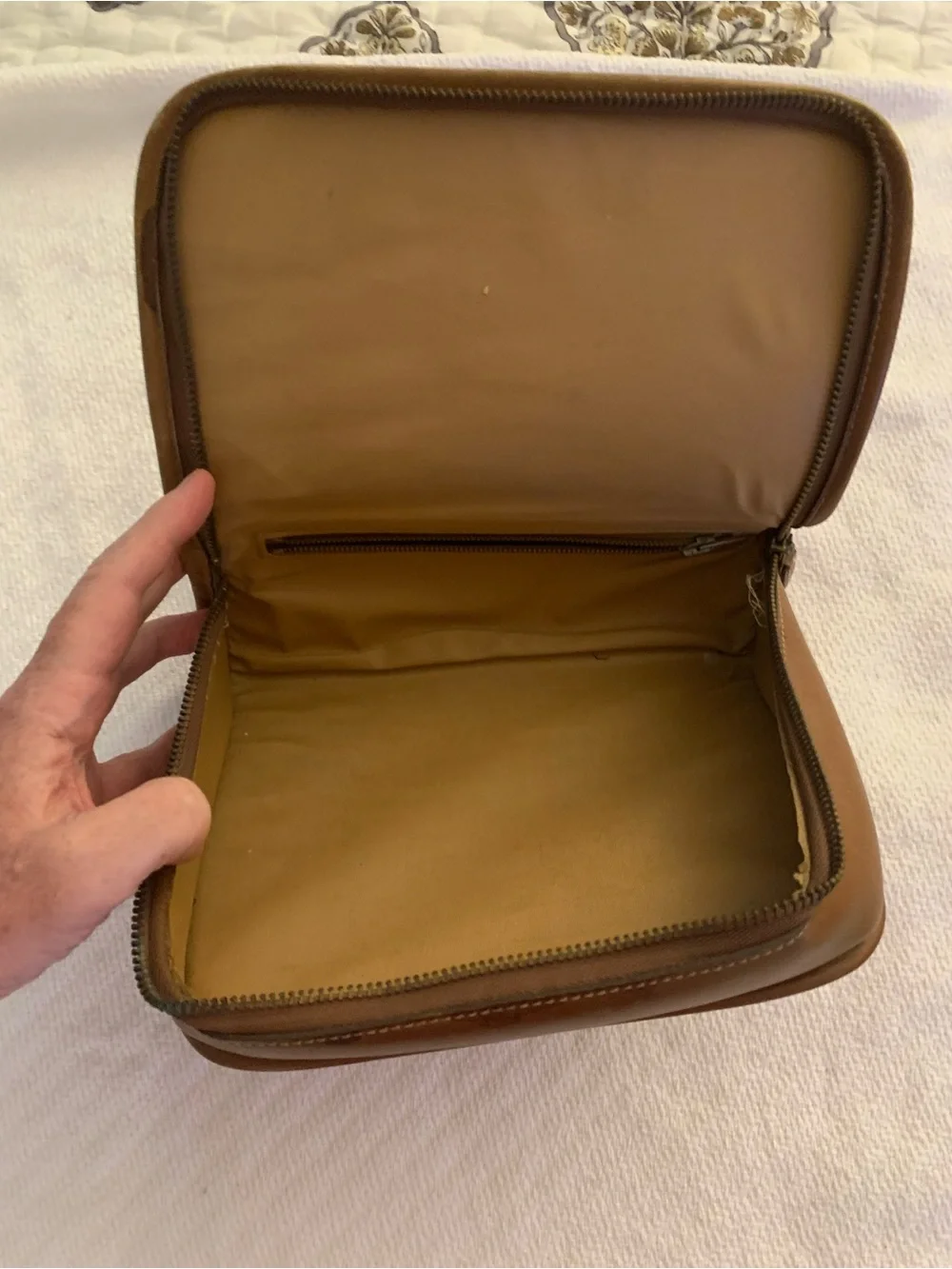 The Sak Brown Leather Garment Bag Panel with Embossed Logo